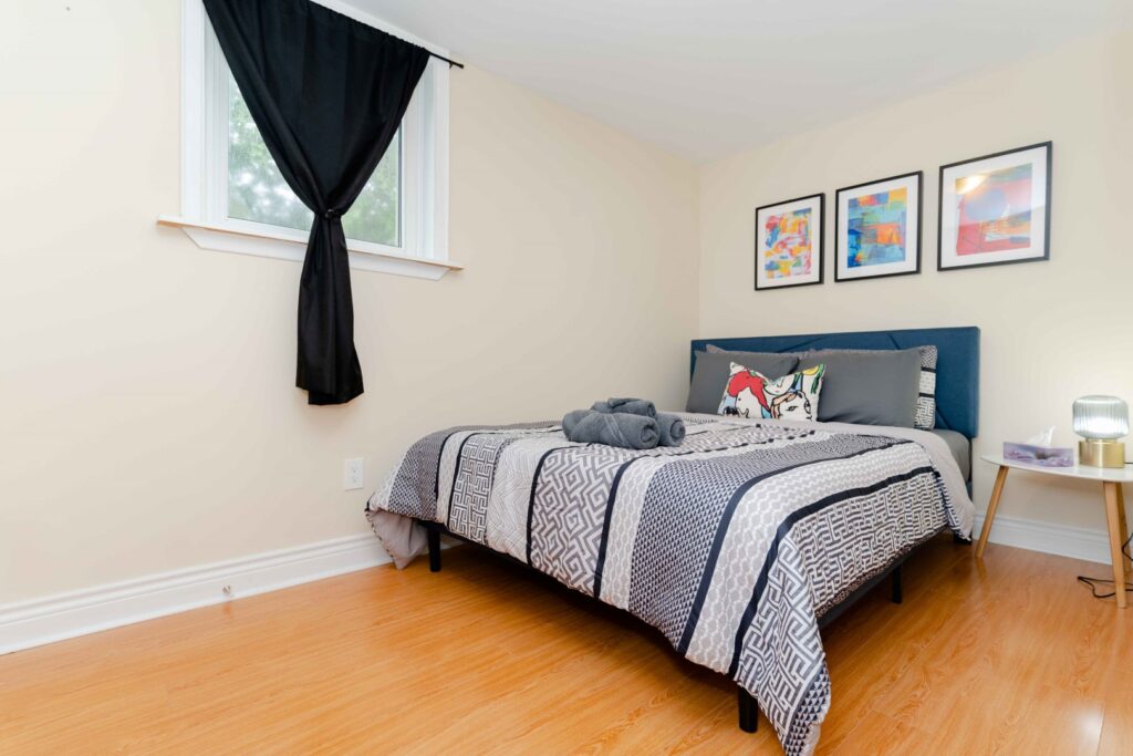 Cozy bedroom in lower unit of duplex