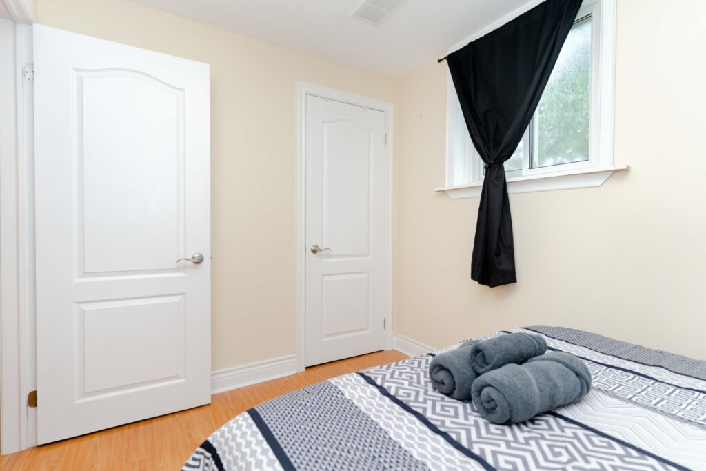Cozy bedroom in lower unit of duplex