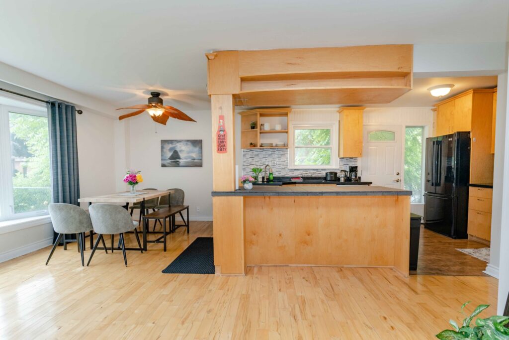 Full kitchen in the lower unit with modern cabinetry